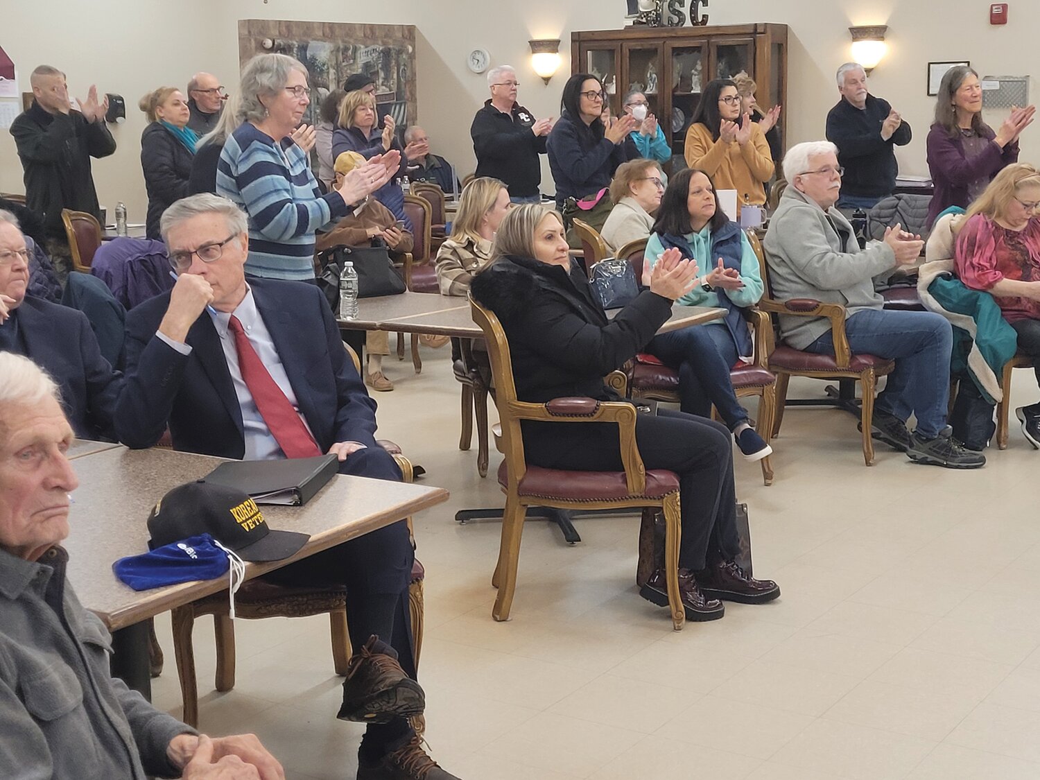 SOLAR ECLIPSED: Residents gathered for Thursday’s Johnston Zoning Board meeting delivered a standing ovation to the board once it voted to deny Cranston-based Green Development’s application to build a solar farm.